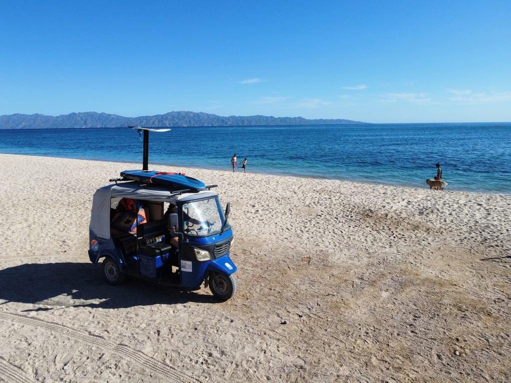 3 wheeled scooter rental on beach